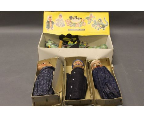 A boxed 'Mother Dragon' Pelham Puppet together with 3 boxed 'Punch & Judy' puppets 