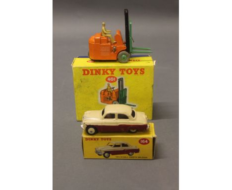 2 boxed Dinky model vehicles: orange forklift truck (401), cream & maroon Vauxhall Cresta saloon car (164)