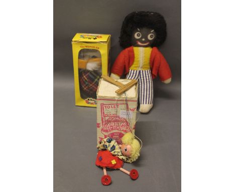 A Womble's Pelham puppet, a vintage string puppet & a vintage golly doll