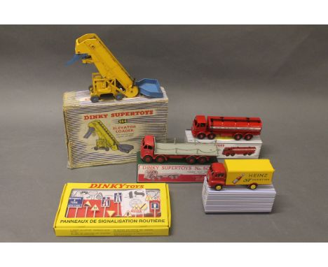 A boxed Dinky Elevator Loader (964), a modern French Dinky set of 12 country road signs (date-2014), a modern Dinky guy van "