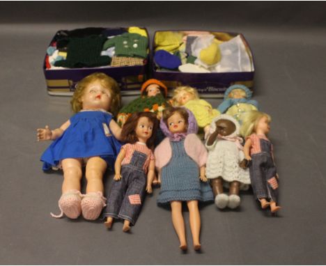 8 vintage dolls together with two boxes of dolls clothing