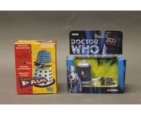 A boxed clockwork Dalek and a boxed Corgi Dr Who Tardis and K-9