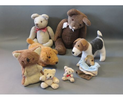 A collection of vintage soft toys including Amica woolen fox terrier and a monkey hand puppet