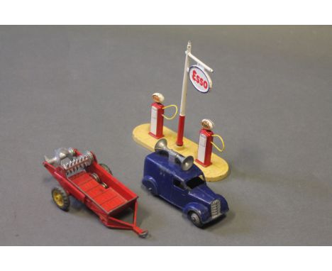 A Dinky Massey-Harris manure spreader (321), a Dinky loud speaker van (492) & a Dinky petrol pump station - Esso (781)