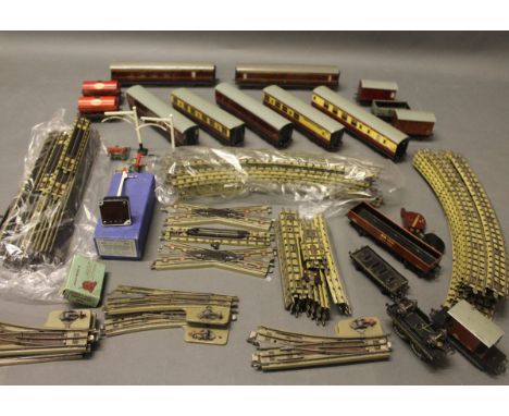 A box of 00 Gauge rolling stock including Esso wagons, coaches, Hornby Dublo single arm signal, track, etc