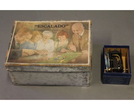 A boxed Chad Valley Escalado mechanical race game & a boxed Meccano E15R electric motor