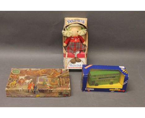 A boxed Knickerbocker Dolly bean bean doll, a Chad Valley jigsaw puzzle & a boxed Corgi Metro bus