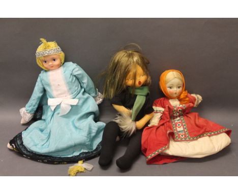 A 1950's Polish tea cosy doll, a 1960's Topsy Turvy mask faced upside down doll & a stuffed shelf doll in black outfit 