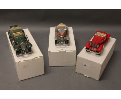 3 boxed Danbury Mint models of vintage cars