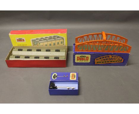 3 boxed Hornby Dublo models: DI Girder Bridge (32141), ED2 Double Arm Signal (32136), Engine Shed kit (2-road) (5005)