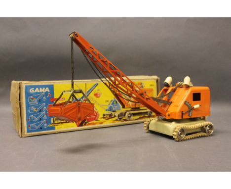 A boxed Gama West German battery operated crane