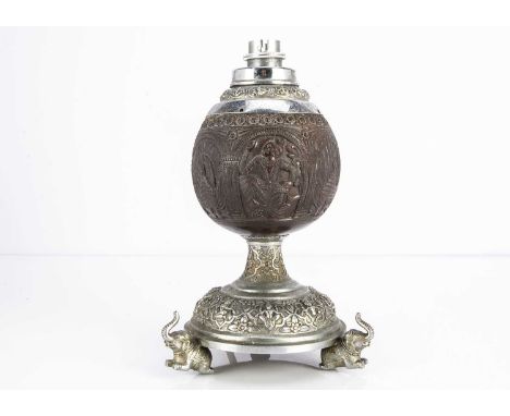 A c1930s Indian carved coconut and silver plated table lamp, 24.5cm high