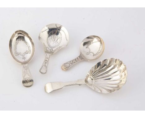 Four Georgian period silver tea caddy spoons, the largest, 9.5 cm long, with shell shaped bowl and fiddle pattern handle, alo