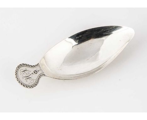 A George III period silver tea caddy spoon, tea leaf shaped with bright cut handle and initials, 8.8cm long