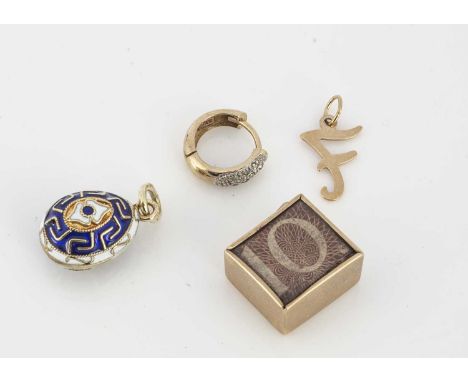 A 14ct gold and enamel decorated egg charm, 3.5g together with two 9ct gold charms and a single hoop earring, 3.8g