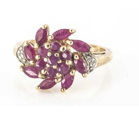 A 9ct gold ruby and diamond floral dress ring, ring size N, 3.3g