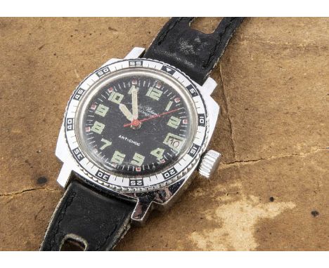 A c1970s Michel Pelissier manual wind divers style mid sized wristwatch, squared 32mm case, black dial with numerals and date