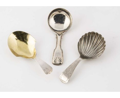 Three early 19th century silver tea caddy spoons, one with circular bowl and fiddle pattern handle by George Unite, and two o
