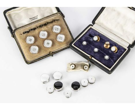A collection of gentleman's dress studs, including a set of six Selfridges mother of pearl and 9ct gold buttons, cased, a gol