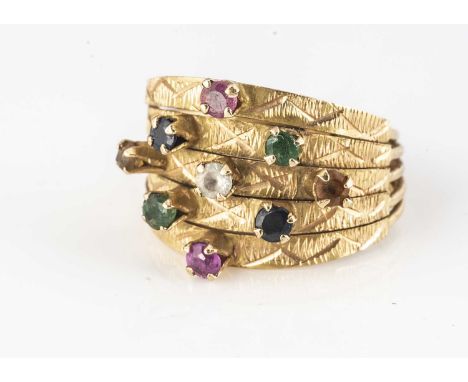 A high carat gold and multi gem set 'Middle Eastern' style dress ring,  set with sapphire, ruby, emerald, rock crystal and ot