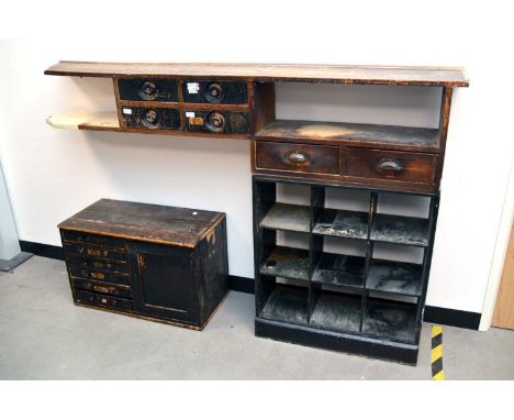 A jewellers tool bench, the oak top with extended top, 121 cm high by 190 cm wide by 29.5 cm deep fitted with drawers