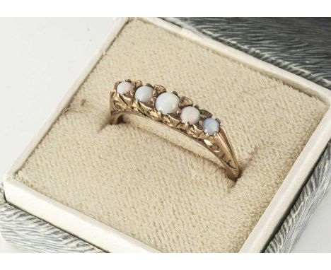 A five stone opal dress ring, within a 9ct gold scroll setting, ring size P, 2.4g