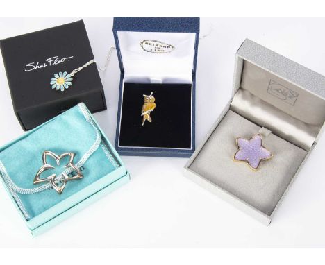 A small quantity of boxed contemporary jewellery, including a Lalique star fish brooch, silver and enamel owl brooch and two 