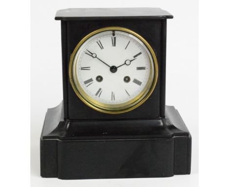 A Victorian black slate eight day rectangular mantel clock, the circular white enamel dial set with Roman numerals, height 22