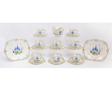 A Tuscan china Deco designed floral tea service comprising two sandwich plates, a jug and bowl, eight tea plates and eight cu