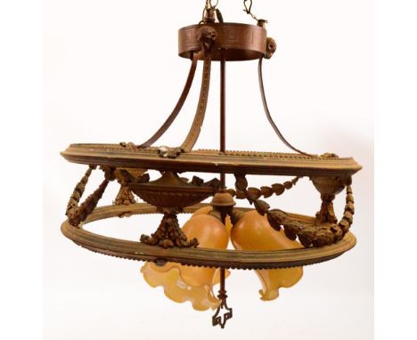 A circular giltwood light fitting decorated with urns and swags and central column supporting three shades.