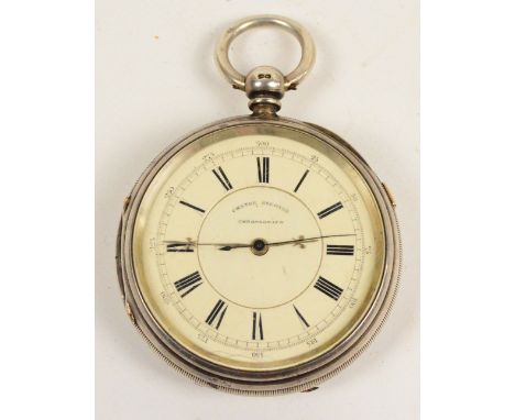 A Victorian hallmarked silver cased key wind open faced centre seconds chronograph pocket watch with white enamel dial set wi