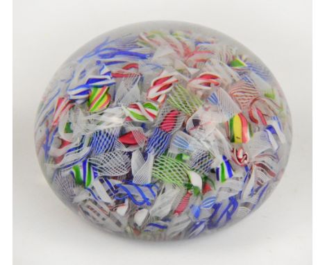 A mid 19th century Baccarat glass "Scrambled" paperweight, the multicoloured canes in seemingly random arrangement, diameter 