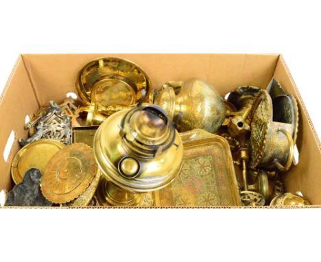 A quantity of predominantly brassware including a lamp base,tray, candlesticks, trivet stands etc.