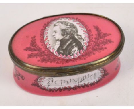 A modern limited edition Halcyon Days Bilston enamel oval box, commemorating Wolfgang Amadeus Mozart, the hinged lid decorate