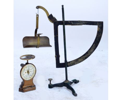 A set of early 20th century brass counter balance by Vandome Titford Co Ltd, London, on tripod base, height 48cm and a Salter