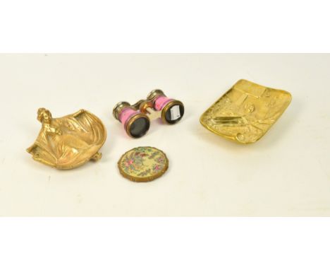 Two late 19th century risqué brass pin dishes or ashtrays, one by Cox & Co of Birmingham, a pair of French opera glasses by C