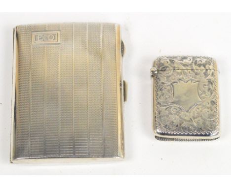 A George V hallmarked silver rectangular cigarette case with engine turned decoration and initials "ED", Birmingham 1929, 9 x