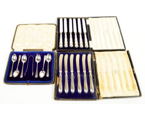 A cased set of six George V hallmarked silver coffee spoons with scallop mould to the finial, and a pair of matching sugar to