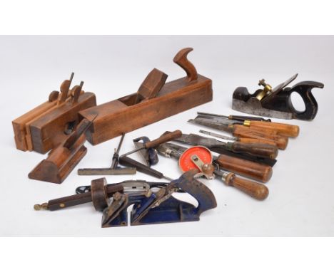 A quantity of vintage professional woodworking tools including a plane by Mathieson of Glasgow, a large plane and a marker by