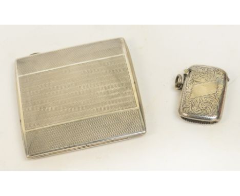 A George V hallmarked silver cigarette case of square shape with Art Deco machine turned decoration, Henry Matthews, Birmingh