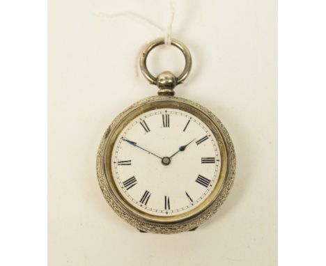 A lady's Victorian hallmarked silver cased manual wind pocket watch with foliate and floral scrolled decoration and vacant ca