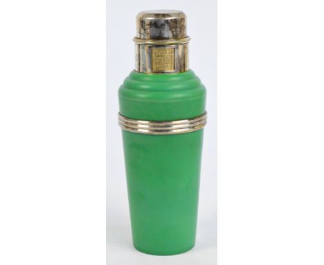 A 1930s Art Deco "The Master Incolor" cocktail shaker with green bakelite body and plated mounts, ribbed band and rotating ca