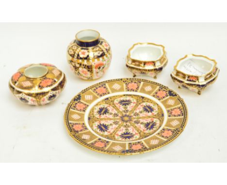 Five pieces of Royal Crown Derby porcelain comprising a circular cabinet plate, pattern 1128, diameter 22cm, two trinket boxe