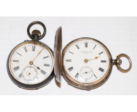 A silver cased manual wind pocket watch with Chester hallmarks, machine turned decoration with monogrammed central cartouche,