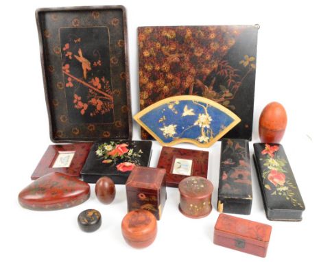 A collection of early 20th century predominantly Japanese lacquered paper mâché to include a rectangular tray, boxes, a tea c