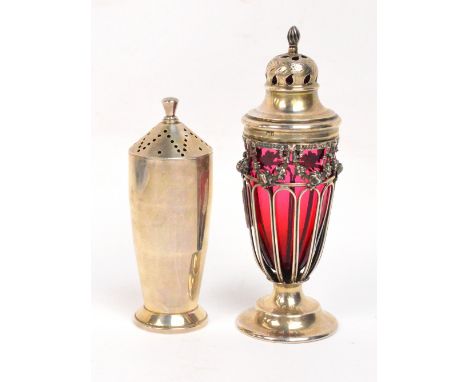 A George VI hallmarked silver Art Deco sugar shaker, Birmingham 1941, height 13cm, approx 3.3ozt, and a silver mounted cranbe