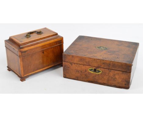 A Georgian mahogany and inlaid rectangular tea caddy, the hinged lid enclosing three sectioned interior, width 24cm and a Vic