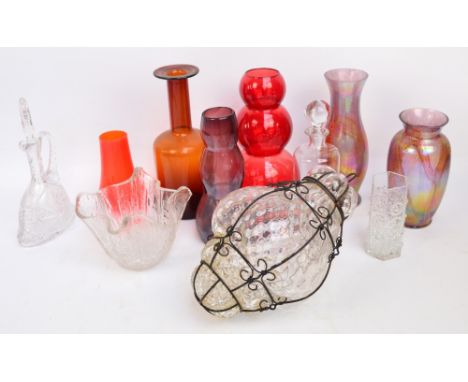 A quantity of glass including a Loetz style iridescent vase, a triple gourd ruby tinted art glass vase, a clear moulded glass