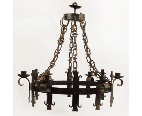 A decorative Gothic style wrought iron circular ceiling light with six candle holders, diameter 64cm. CONDITION REPORT: Custo
