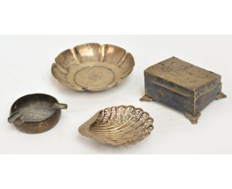 A late Victorian hallmarked silver pierced scallop moulded dish, Sheffield 1896, a Peruvian silver ashtray, a beaten shallow 